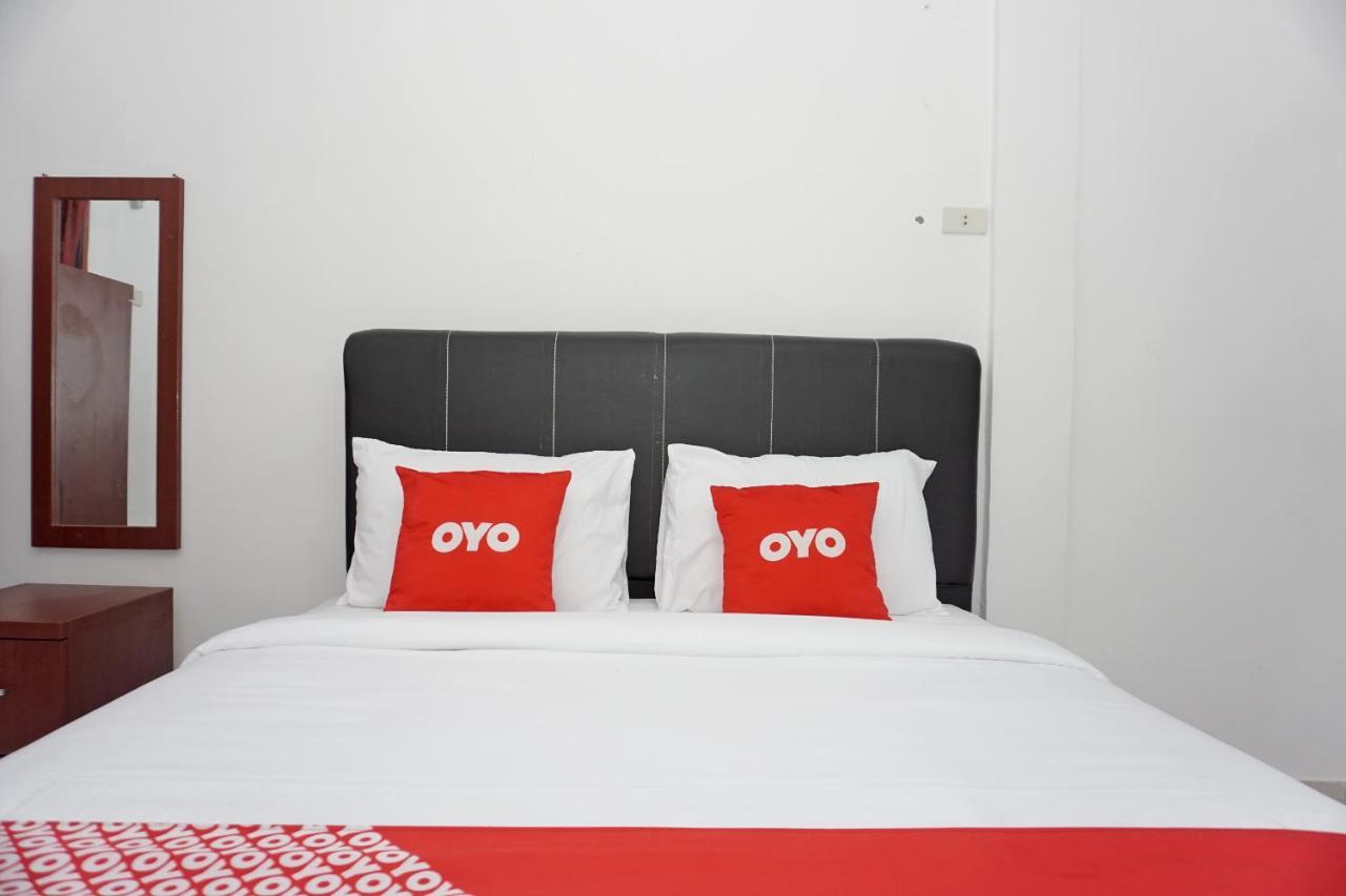 Oyo 2635 Ramos Inn Sinapuran Экстерьер фото